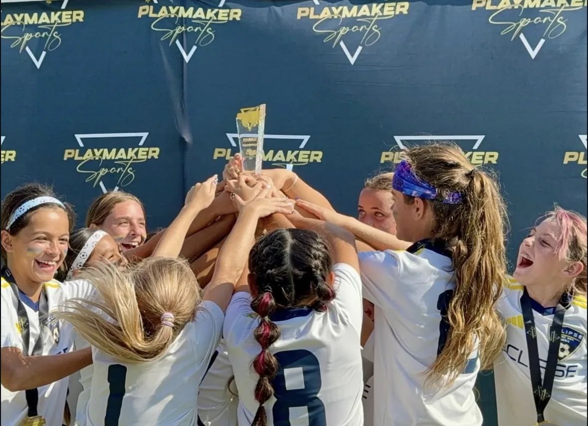 Playmaker Sports champions celebrating together